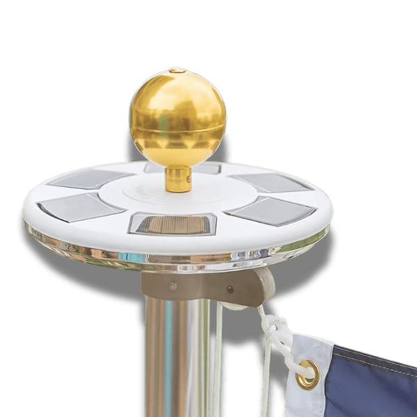 Gold-topped flagpole with solar panel
