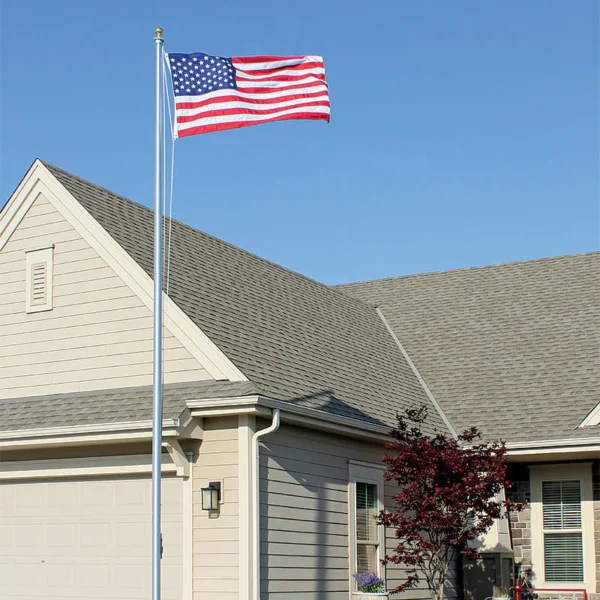 Suburban home with U.S. flag