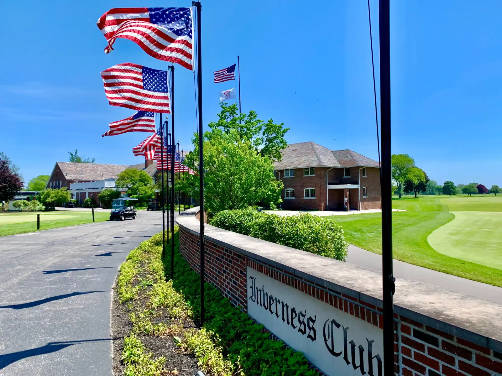 Golf club entrance with American flags