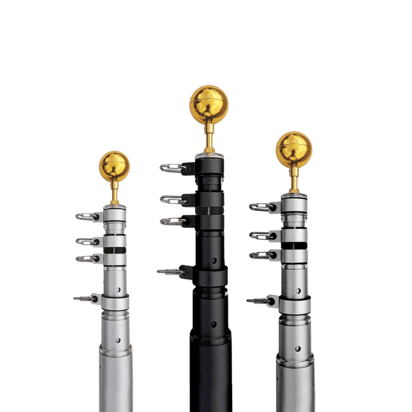 Urban bollards against a black background