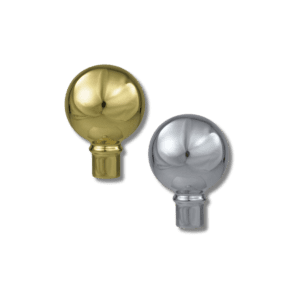 Gold and silver spherical finials on black