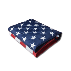 Folded American flag on black background