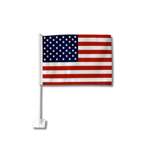 American flag on pole against black background